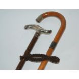 A silver-mounted walking cane and another walking cane with silver-mounted collar (2) Condition