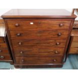 A Victorian mahogany five drawer chest with turned drawer handles, 120cm high x 117cm wide x 59cm