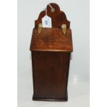 A Victorian oak candle box with hinged lid, 37cm high Condition report: Available upon request