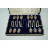 A cased set of twelve silver teaspoons with tongs, Sheffield 1917 Condition report: Available upon