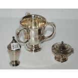 A lot comprising a silver triple-handled christening cup, Birmingham 1930, 9cm high with a silver