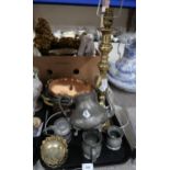 A lot comprising copper kitchenware, a brass lampshade, pewter tankards and a teapot, brass moulds