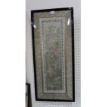 A framed Chinese embroidery panel depicting flowers and birds Not available for this lot