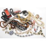 A collection of vintage costume jewellery, to include beads, Deco items in the style of Jakob Bengel