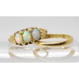 An 18ct gold three opal ring., size P, together with an 18ct wedding ring size M, weight together