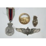 A lot comprising a sterling silver Pilot's badge marked N S Meyer Inc. New York, a Duke of Connaught