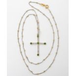 An Italian made bi colour 18ct gold ball chain, length 50cm with a emerald and diamond cross, 3.