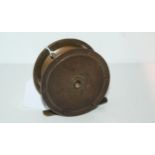 An early Hardy Bros brass reel, 9.5cm diameter, stamped Hardy Bros, Makers, Alnwick Condition