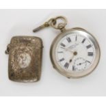 A continental silver open face pocket watch retailed by H.Samuels and a silver vesta case