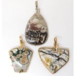 Three American silver and gold plated wire wrapped mineral pendants to include marine jasper, and