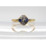 An 18ct gold diamond and blue gem set vintage ring, size K, weight 2.1gms Condition Report:Available