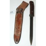 A bayonet/fighting knife in leather scabbard 29 cm o/all length Condition Report:Available upon