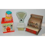 A Fisher Price jack-in-the-box, child's scales and till Condition Report:Available upon request