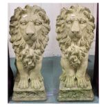 A pair of contemporary reconstituted stone garden lions, 76cm high (2) Condition Report:Available