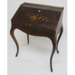 A Victorian rosewood and marquetry inlaid continental writing bureau with a pierced brass gallery