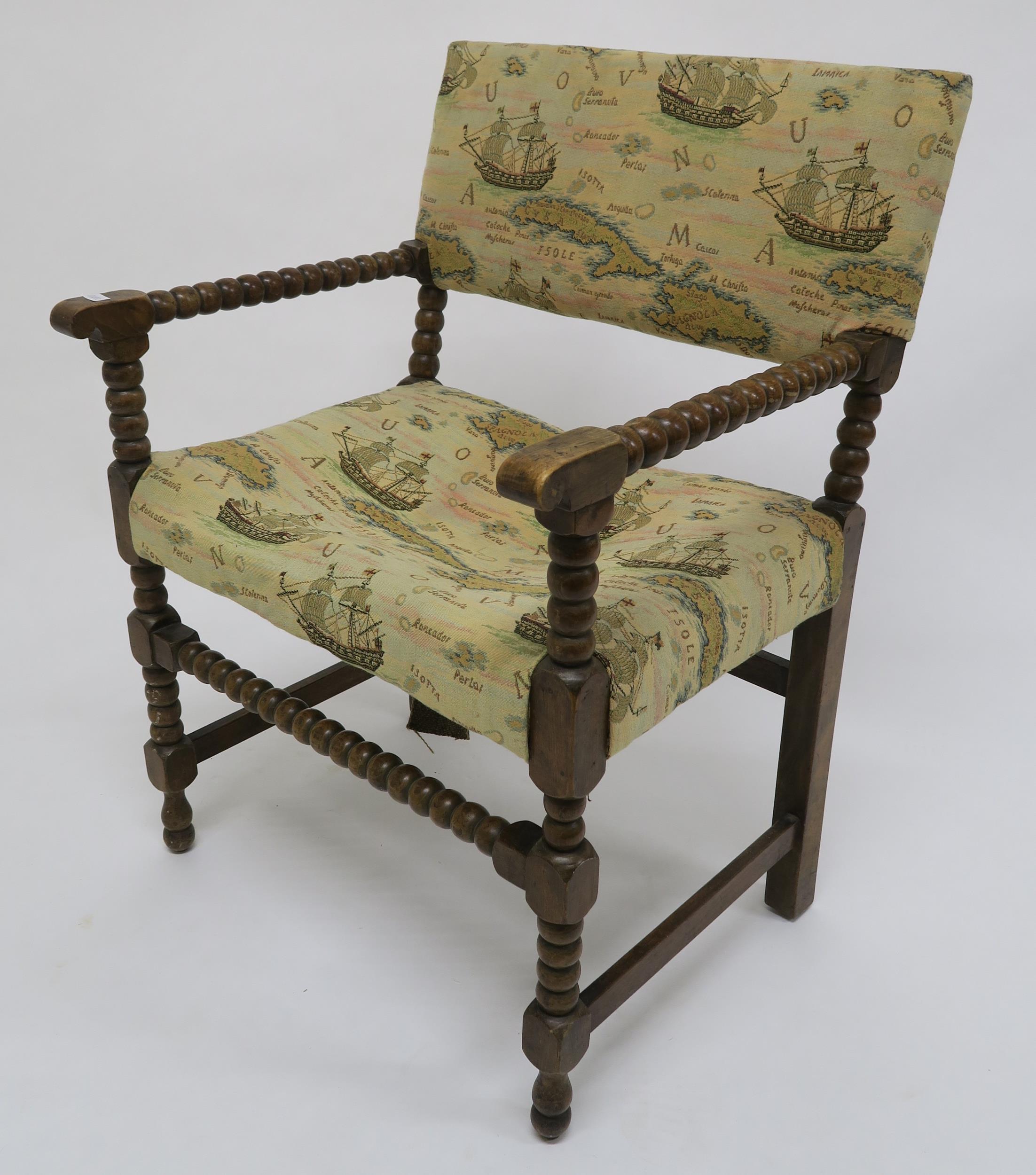 A Victorian beech framed bobbin turned armchair with tapestry upholstery Condition Report: