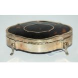 A silver jewellery box with hinged tortoiseshell inset cover, rubbed marks, 11.5cm wide Condition