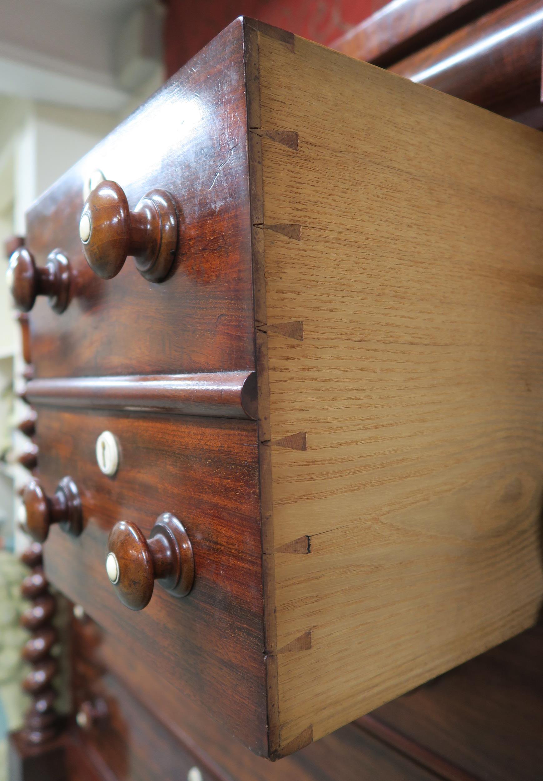 A Victorian mahogany "Scotch" chest of drawers with four above three drawers flanked by barley twist - Image 4 of 15