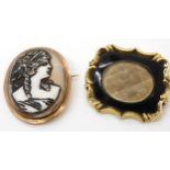 A yellow metal mounted locket back plaited hair mourning brooch 3.9cm x 3.3cm and a 9ct mounted