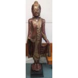 A 20th century painted wooden statue of the Buddha, 191cm high Condition Report:Available upon