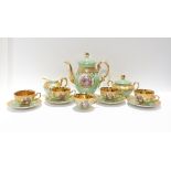 A Royal Bavaria green ground and gilt decorated tea service decorated with cartouches of courting