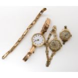 A 9ct gold ladies vintage watch, two 9ct gold watch heads, and a 9ct strap, weight holding the