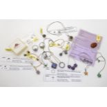 A collection of silver Gems TV gem set jewellery to include pink spinel, tanzanite and a Russian