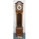 A 20th century maple cased "Tempus Fugit" longcase clock with cast brass reliefs, 194cm high x