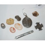 A lot comprising a white metal Peace medal, a citrine set fob, two unframed cameos, a silver medal