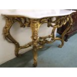 A 20th century serpentine marble top gilt Rococo style console table, 83cm high x 131cm wide x
