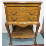 A 20th century oak two drawer canteen containing assorted silver plate and accompanying oak tray,