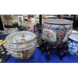 A large Chinese enamelled fish bowl decorated with gilt, and another blue ground example with