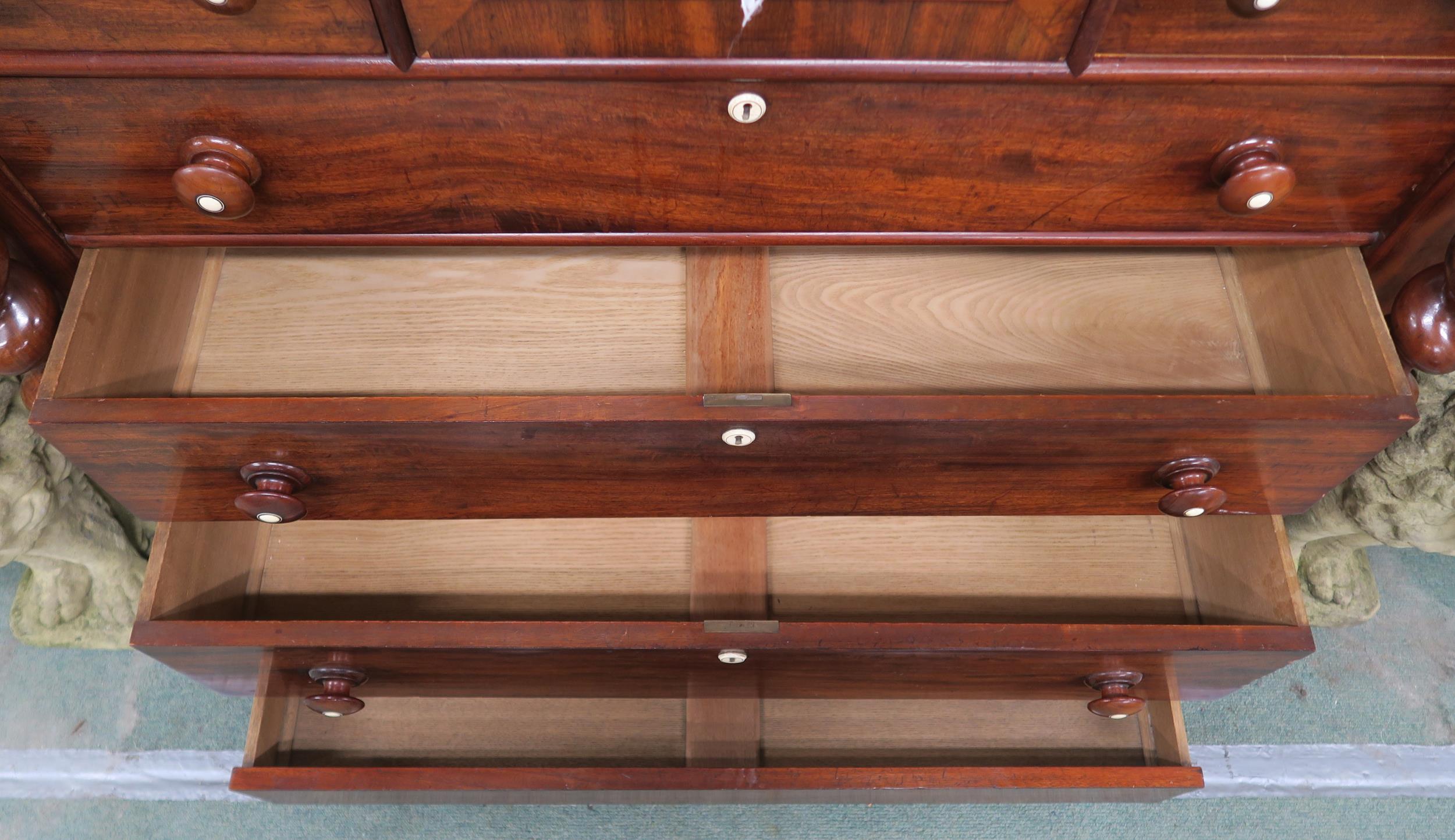 A Victorian mahogany "Scotch" chest of drawers with four above three drawers flanked by barley twist - Image 7 of 15