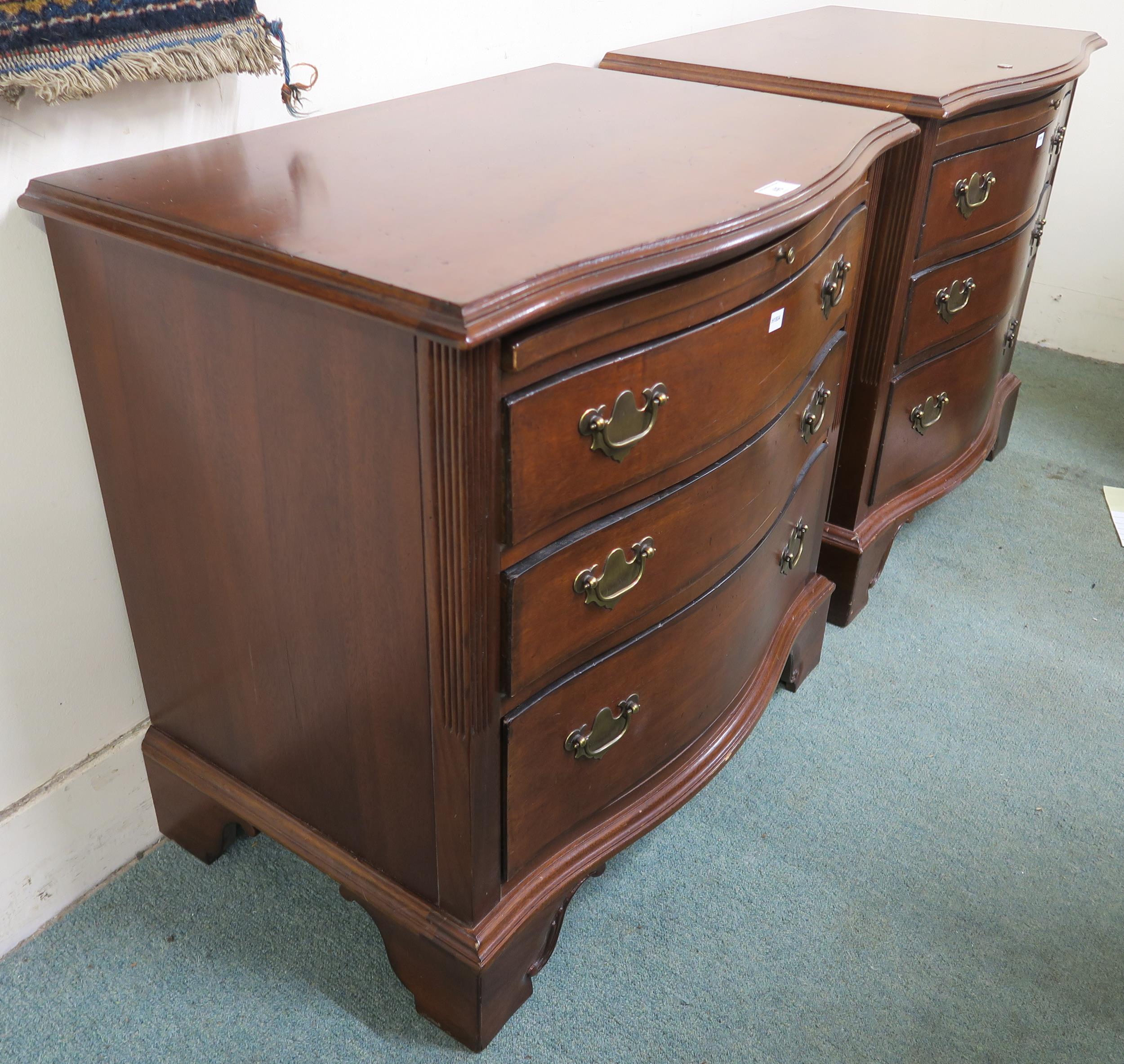 A pair of 20th century mahogany serpentine front three drawer chests, 69cm high x 71cm wide x 48cm - Image 2 of 3