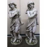 A pair of contemporary stoneware figural statues of ladies (2) Condition Report:Available upon