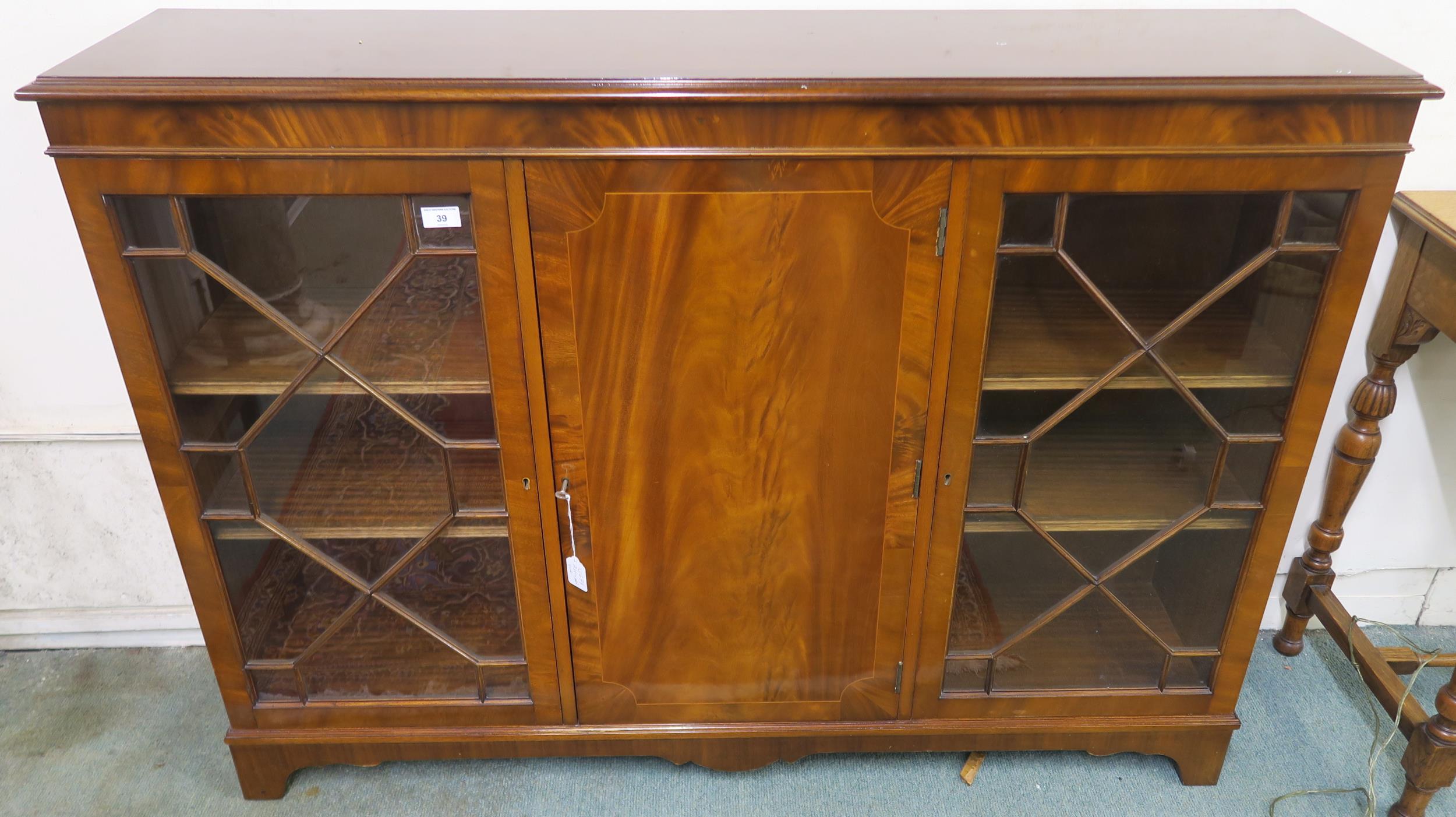 A 20th century mahogany astragal glazed display cabinet, 100cm high x 138cm wide x 32cm deep