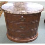 A 20th century walnut marble topped oval chest of three drawers, 75cm high x 81cm wide x 56cm