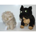A Einko style dog with stich claws, 26cm wide and a musical cat (2) Condition Report:Available