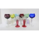 A set of flashed and cut glass wine glasses, a pair of pink stemmed roemers with etched grape and