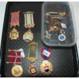 A lot comprising one silver gilt Masonic medal, four gilt metal medals with a selection of small
