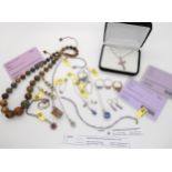 A collection of silver Gems TV gem set jewellery to include fire opal ring, jade beads and emerald