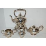 An EPNS four piece tea service with kettle on stand Condition Report:Available upon request