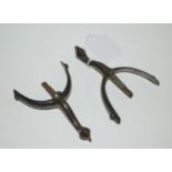 A pair of metal spurs Condition Report:Available upon request