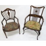 A Victorian walnut and fruitwood inlaid parlour armchair and another similar Victorian mahogany