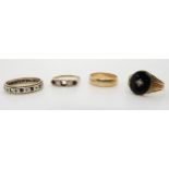 A gents diamond set onyx signet ring, size 1, 9ct wedding ring size S1/2, and two further 9ct gem