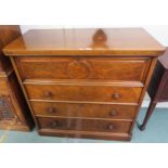 A Victorian walnut chest of drawers with three drawers below fall front compartment containing