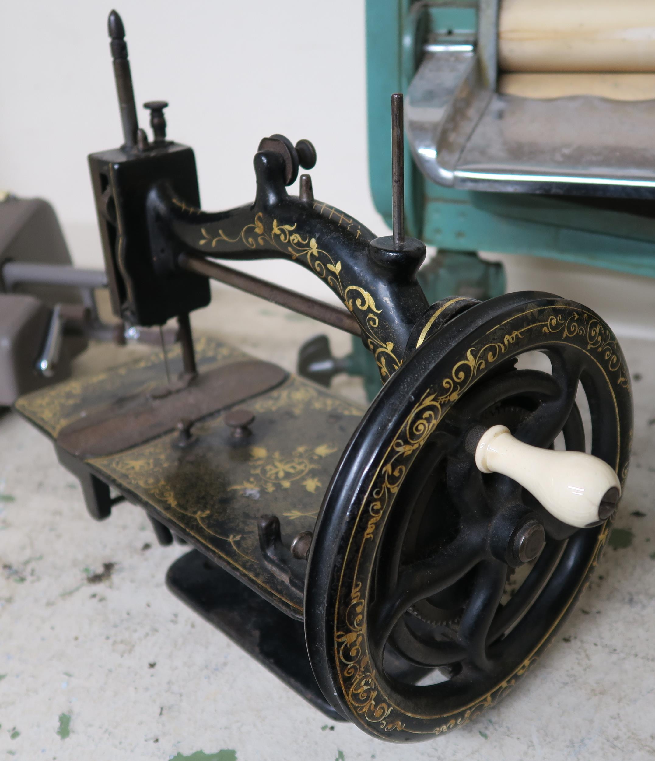 A Victorian "The Lockman 1869" portable sewing machine, An "Acme 55 14" portable" mangle, Nippon - Bild 3 aus 5