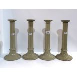 Two pairs of Wedgwood sage green glazed candlesticks Condition Report:Available upon request