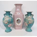 A pair of turquoise glazed satsuma vases decorated with dragons, and an armorial style vase