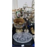 A pair of Royal Vienna style urns decorated with scenes of ladies conversing, upon matching bases, a